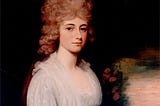 Louisa Adams in a muslin dress with a blue sash. Her ash-blonde hair is thick and curly.