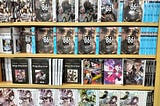 Rows of light novels on the shelves of a Gramedia store.