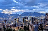 Cityscape of Medellin, Colombia at dusk.