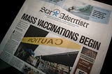 Star newspaper stating: Mass Vaccinations Begin