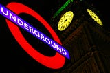 London Underground sign and Big Ben clock