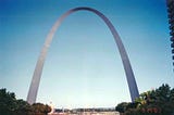 World’s tallest arch with trees to the side and a blue sky behind, The Gateway Arch, St. Louis, Missouri, July 14, 2001