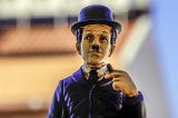 charlie chaplin figure in blue