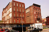 Boarded up buildings in Harlem.