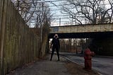 Author standing beneath Boston MBTA subway overpass. Photo: E. Stephen Frederick