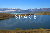 New Zealand landscape scene of a lake with mountains in the background and the word “space” over the top, with a watermark underneath saying “Bold”