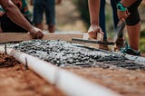 People building a wall