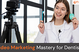 A woman in a white coat holds a toothbrush and floss while speaking to a camera on Video Marketing for Dentists. Text reads, “Video Marketing Mastery for Dentists.