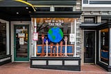 A shop front saying that we are all in this together