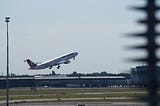 Plane Taking Flight at Schiphol Airport in Amsterdam