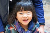 Asian girl laughing