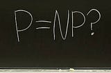 “P=NP?” written on a blackboard