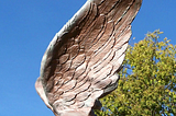 Eagle wings in front of the Navy Station Puget Sound