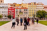 Group of people in a square in Lisbon.