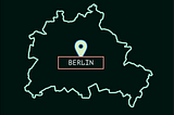 an outline of Berlin with a map pin