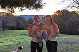 Photo of author and her twin sister and niece