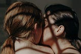 Two women embracing