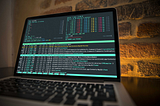 An image of a laptop with error messages displayed on it’s screen.