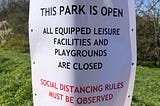 Reading Council note outside Balmore Park informing that Social Distancing rules must be observed.
