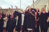 Photo of me and my friends at on my graduation day.