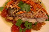 pan seared red snapped with confit tomatoes and fresh jicama/carrot slaw
