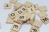 a pile of Scrabble tiles