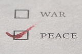 A Note on Peace Day: The Reality of War, Darkness, and a Two-Faced World