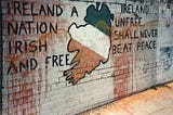 A spray painted wall that has been vandalized in Derry, 1986. Courtesy of Wikinews.org