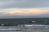An image of Atlantic Ocean waves coming onto Savannah, Georgia coastal shore