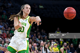 Sabrina Ionescu of the Oregon Ducks passes the ball.