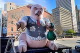 picture of a fat pig with loads of money. it’s a rich pig like me