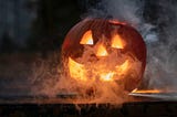 Smoky Halloween jack-o-lantern with smiley face