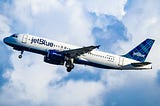 How do I talk to a real person at JetBlue?