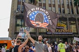 Demonstrators from conspiracy theorist group QAnon protesting in Los Angeles. Photo: AFP