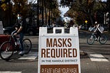 Here’s Why Vaccinated People Still Need to Wear a Mask