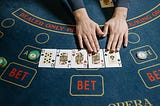 How to End Poverty in a Poker Game Economy
