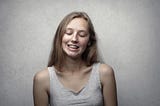 Young woman with braces on her teeth