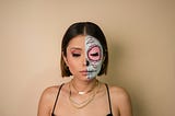 Woman with half painted skeleton face
