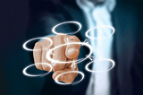 business man drawing a flow chart with circles and arrows
