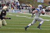 Air Force quarterback Connor Dietz runs for the end zone.