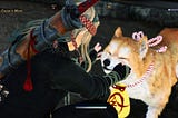 The customized player character pets the cheeks of the pilgrim dog in Rise of the Ronin. The dog is brown and white with a yellow back around his neck, which he carries into other players’ games to give them items.