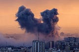 huge cloud of smoke and dust in sky after a bomb