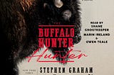 Stark audiobook cover for The Buffalo Hunter showing a close-up of a buffalo against a muted background, with bold red and black title text. A chilling, anticipated release by acclaimed author Stephen Graham Jones.