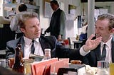 Screen capture from Reservoir Dogs with Tim Roth and Harvey Keitel.