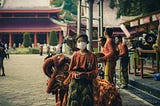 Kids performing dance and rituals at tourist spots.