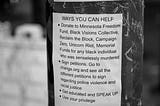 Telephone pole with flyer for ways to help the black lives matter movement