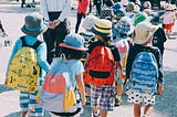 A group of young children walking together