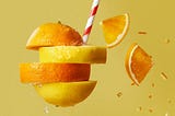 orange and lemon slices on a straw