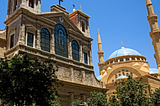 A Maronite Christian church across the street from a Muslim mosque in downtown Beirut.