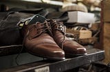 A brown leather shoe repaired at f & C, looking all new